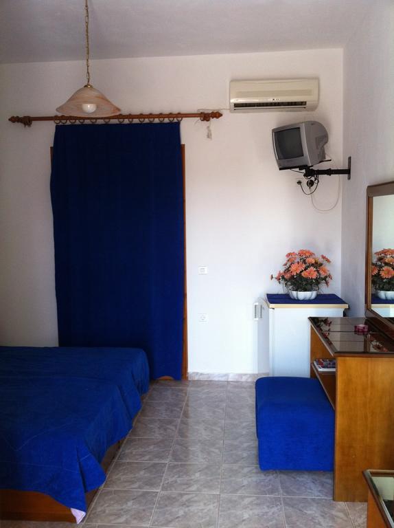 Porto Milos Hotell Adámas Rom bilde